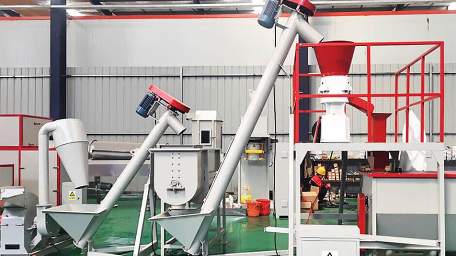 Feed production machine